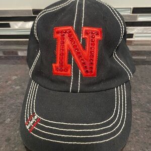 Black and Red Trucker Hat with Bold Husker N
